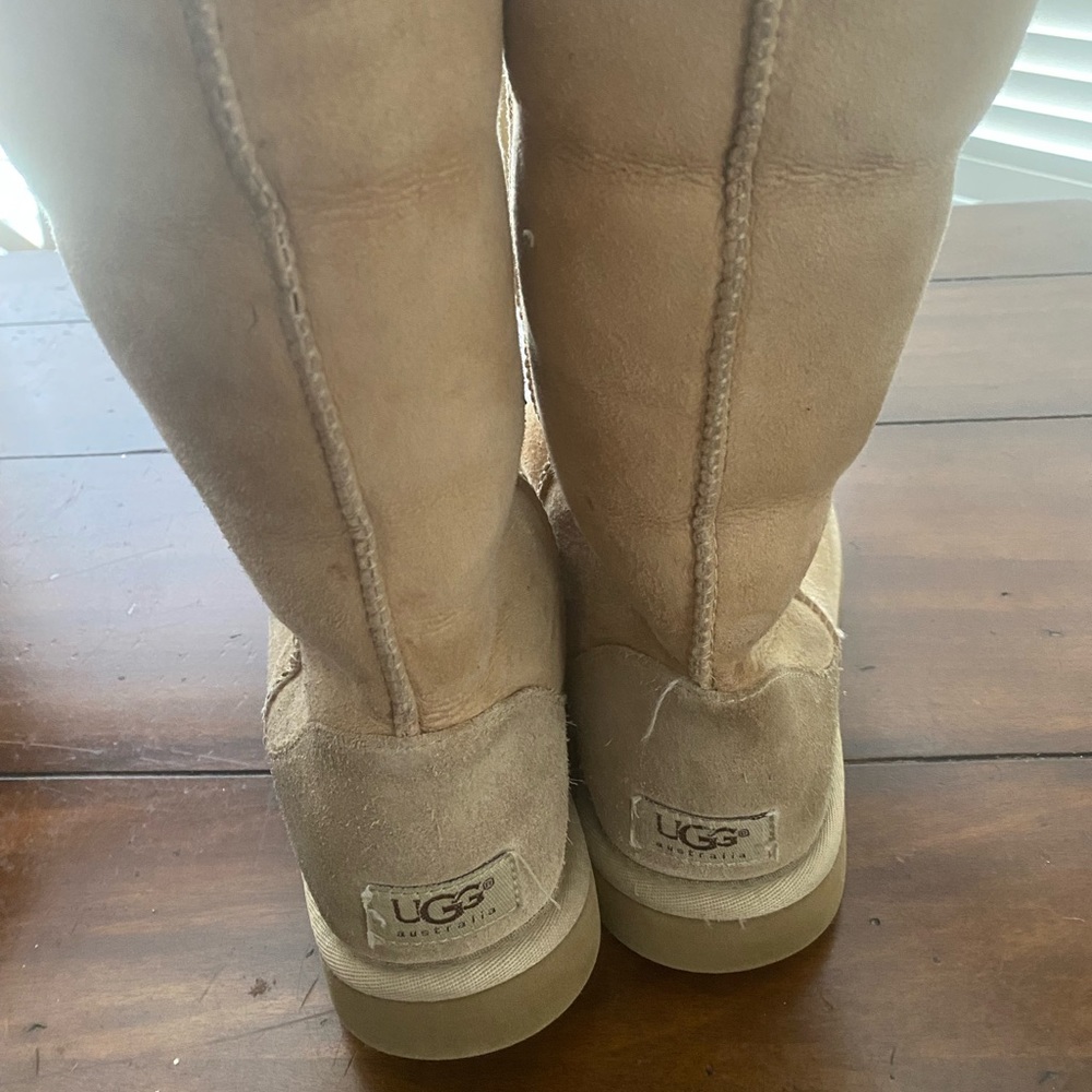 Women’s size 7, Classic Tall UGG boots. Very worn.
